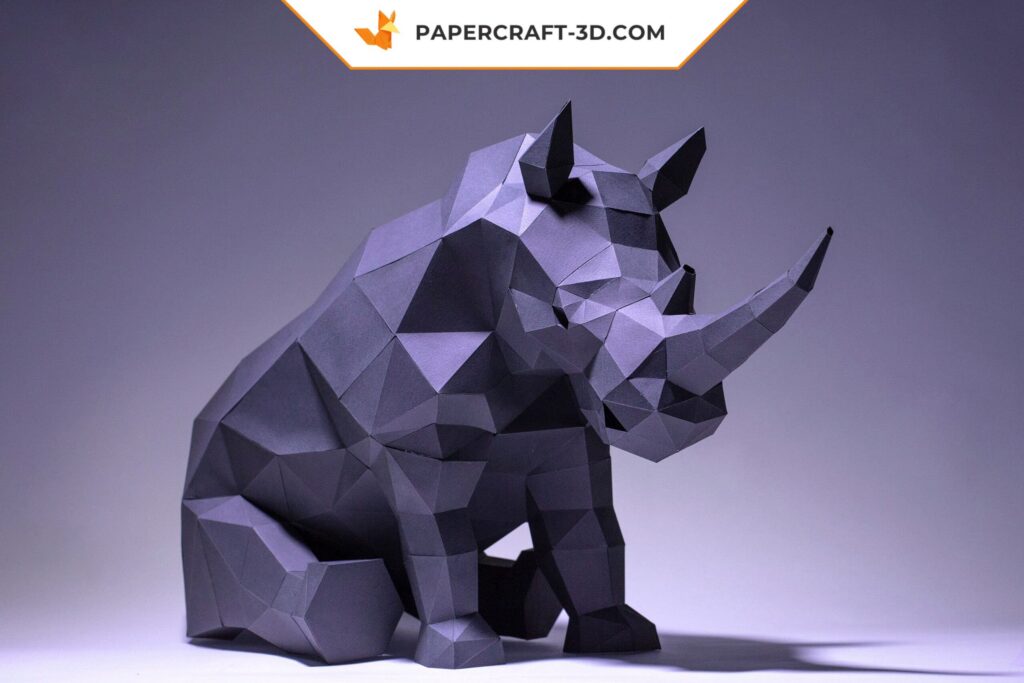 Papercraft de rhinocéros assis en 3D