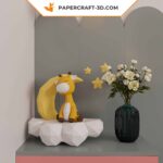 Papercraft girafe endormie sur la lune, modèle en papier 3D