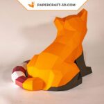 Papercraft panda roux assis en origami