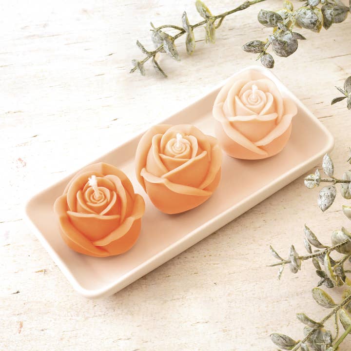 Bougies fleurs roses