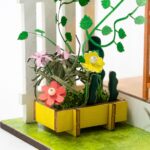 Maison Miniature Fleur ensoleillée